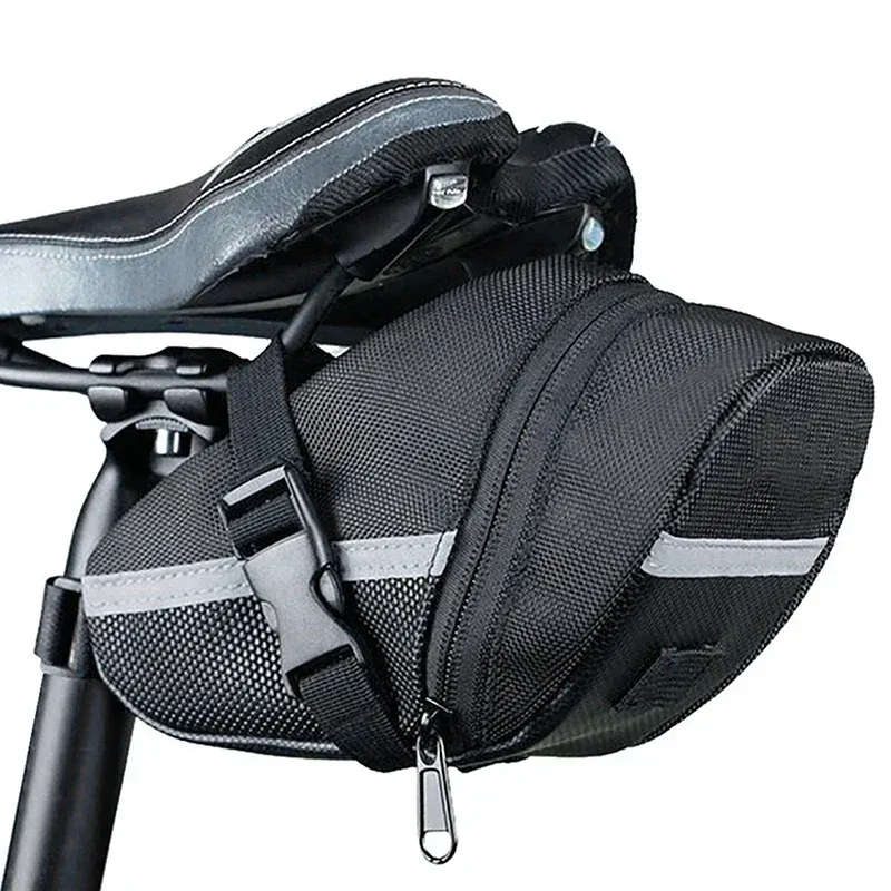 Ridgeline Wedge black saddle bag with reflective strip mounted under a bike saddle